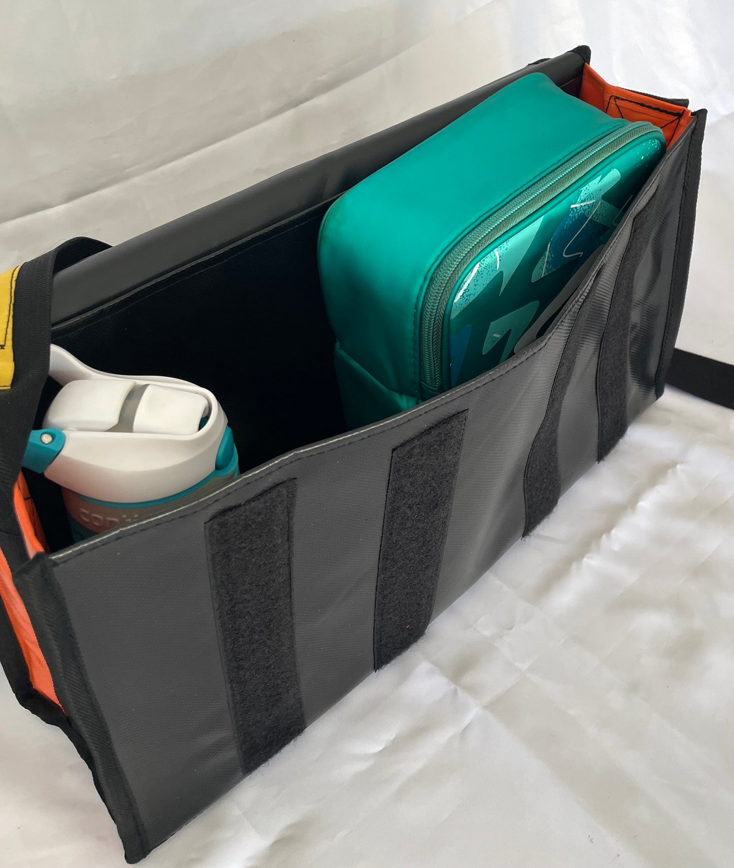 CribBags Small Black and Orange Crib bag. Tough Vinyl Construct, Document pocket inside