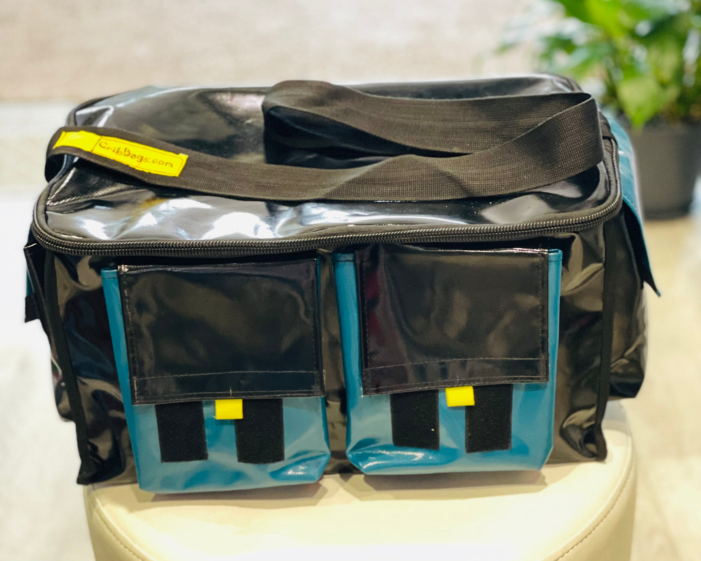 CribBags NEW ZIP Extra Large Black and Teal Crib bag. Tough Vinyl Construct 4 pockets outside, 3 pockets inside.