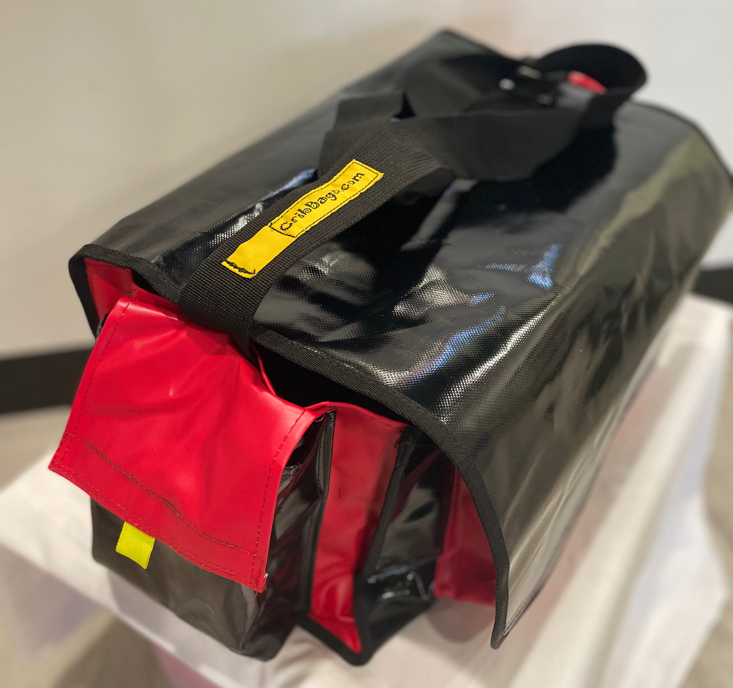 CribBags Extra Large Black and Red Crib bag. Tough Vinyl Construct 4 pockets outside, 3 pockets inside.