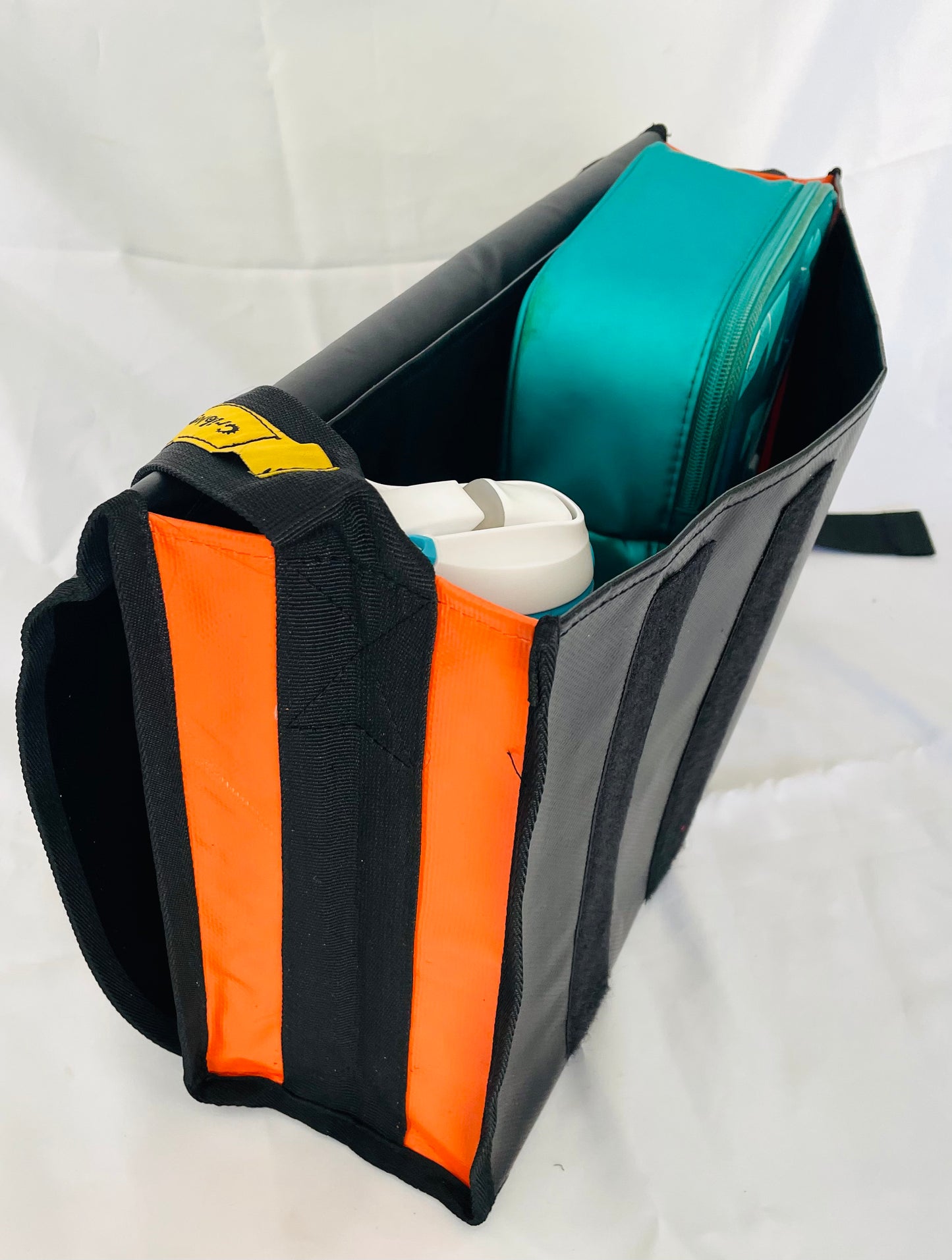 CribBags Small Black and Orange Crib bag. Tough Vinyl Construct, Document pocket inside